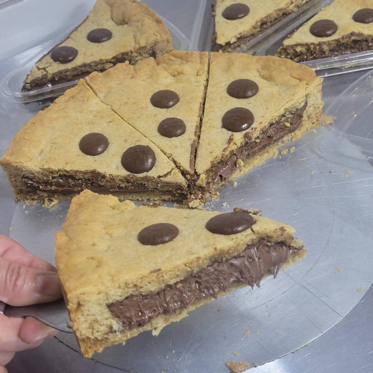 Uma deliciosa massa de cookies bem recheada com Nutella pura, surreal sabor! Aproximadamente 200g