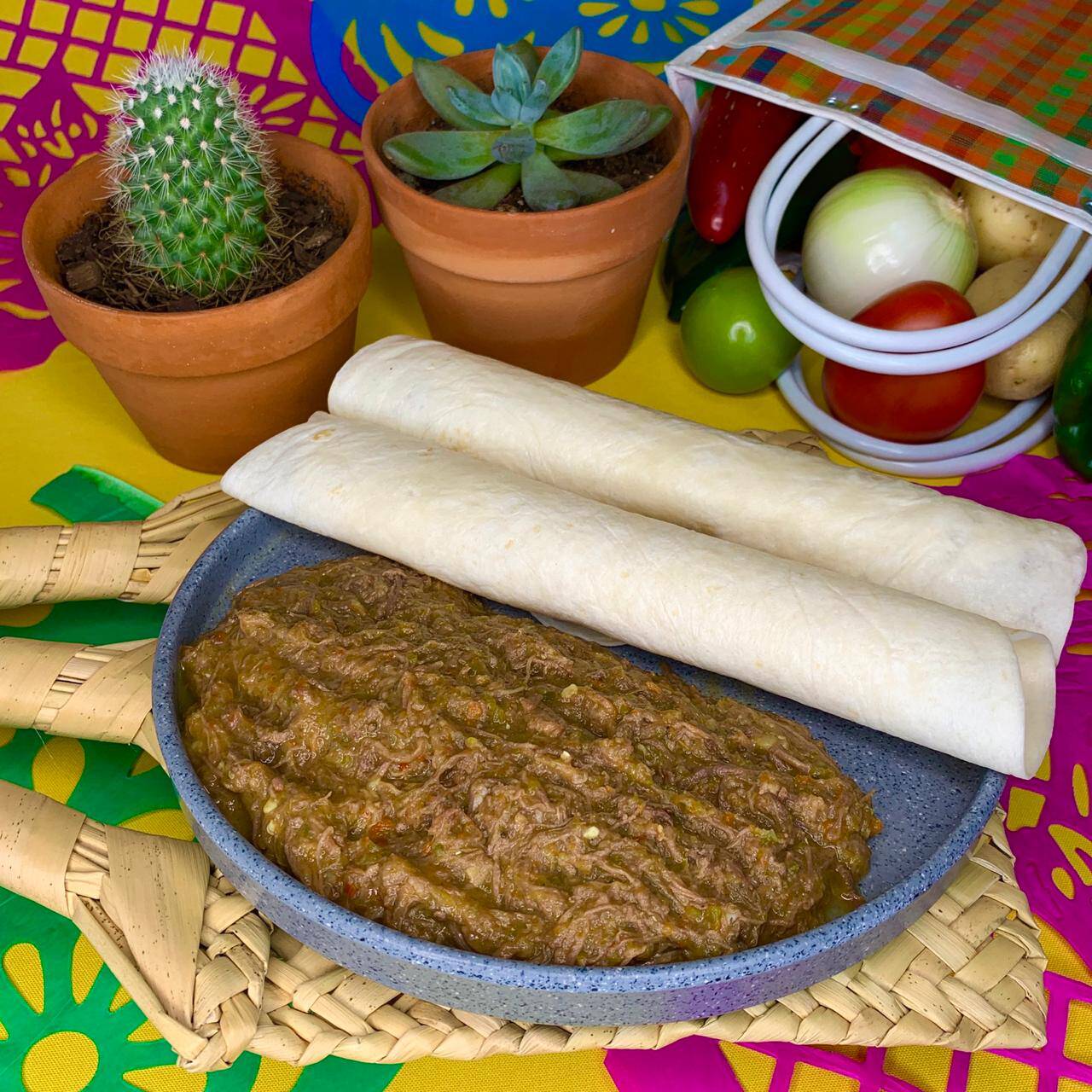 Burrito deshebrada en salsa verde