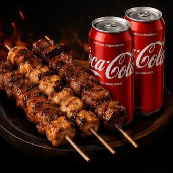 4 espetinhos + 2 Coca-Cola lata.