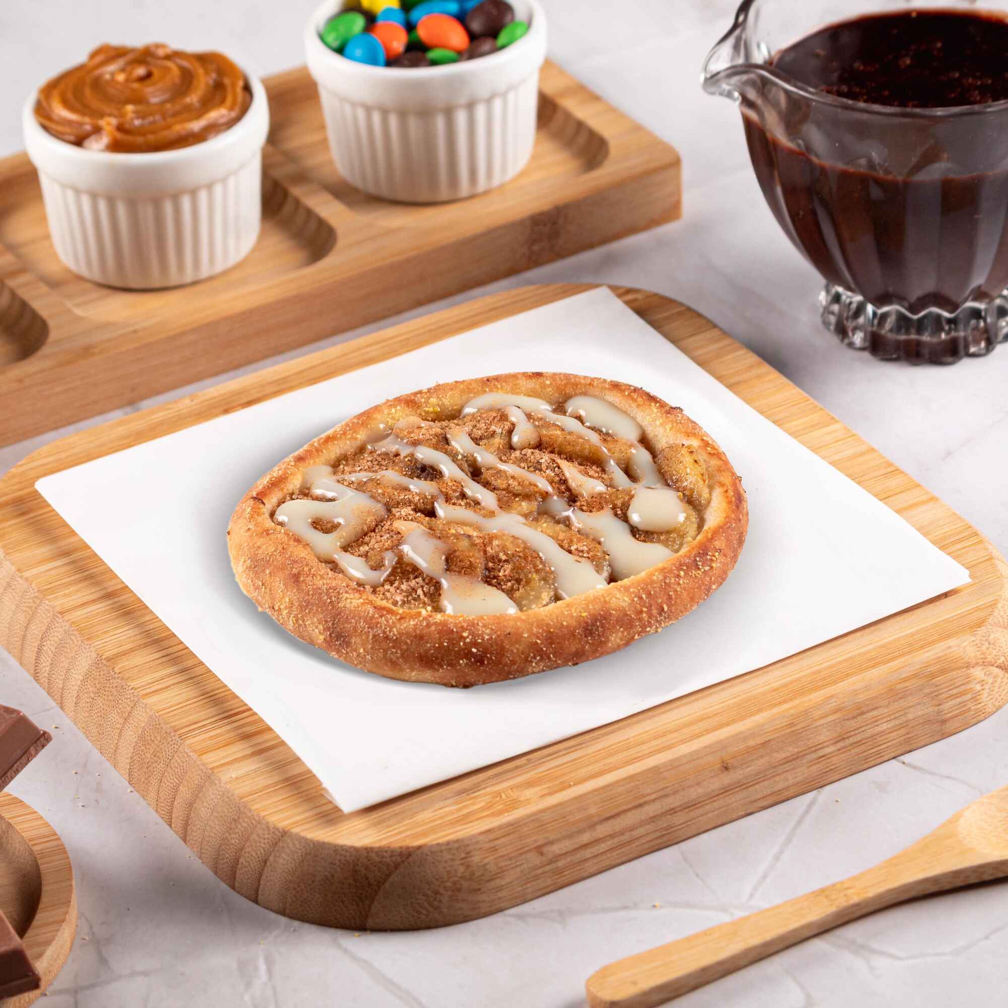 Recheada com leve toque de muçarela, banana, açúcar, canela e leite condensado, uma combinação perfeita de sabores doces e suaves.