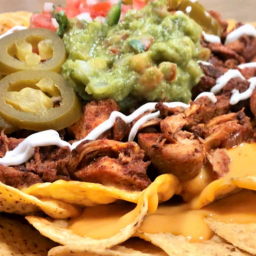 NACHOS CON PASTOR