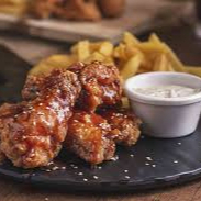 Alitas 6 Unds (Escoger Sabor) + Papas y Ensalada