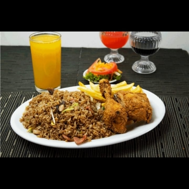 Porción Arroz más Pollo Broaster