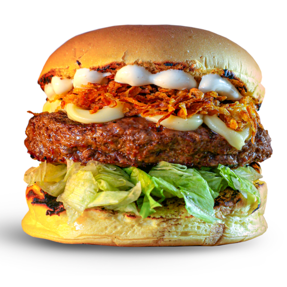 Pão Brioche, Hambúrguer artesanal 170g, Alface, Requeijão cremoso e Cebola Crispy