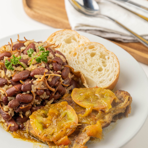 Calentado de Frijol + Huevo + Pan +Jugo De Naranja