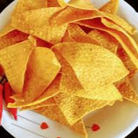 DELICIOSAS TORTILLAS DE MILHO COM FORMATO TRIANGULAR E CROCÂNCIA ÚNICA. (90G)