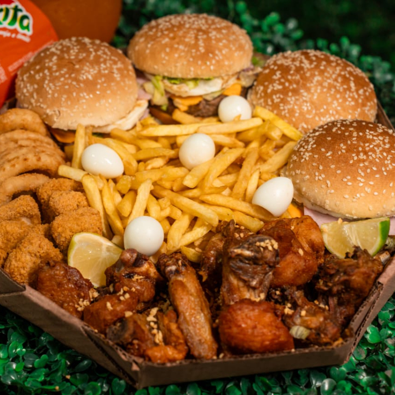 4 x-tudo(carne ,queijo, presunto ,bacon, maionese temperada , catchup ,cheddar cremoso ,salada) porção de frango à passarinho , 6 onion , 6 nuggets , batata com ovos de codorna .