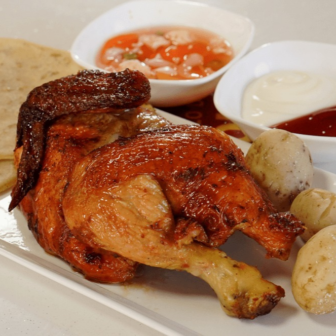 Medio pollo asado al carbon