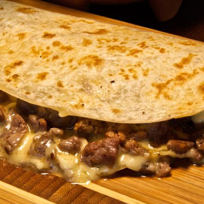Gringa de Arrachera y 4 quesos