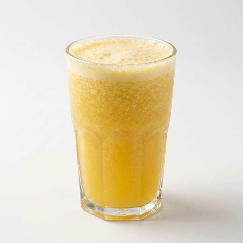 Nosso 'Suco de Abacaxi 410ml', da categoria 'Bebidas da Casa', é uma opção irresistivelmente refrescante e deliciosamente saborosa. Este suco natural é extraído diretamente da polpa do abacaxi, garantindo um sabor autêntico e memorável. Servido bem gelado, proporciona uma experiência revitalizante e gratificante, perfeita para acompanhar todas as refeições ou para se refrescar em um Dia quente. O equilíbrio perfeito entre a doçura e a acidez se destaca em cada gole, tornando o nosso suco de abacaxi genuinamente irresistível. Experimente e sinta a distinção de um suco preparado com atenção minuciosa e dedicação apaixonada.