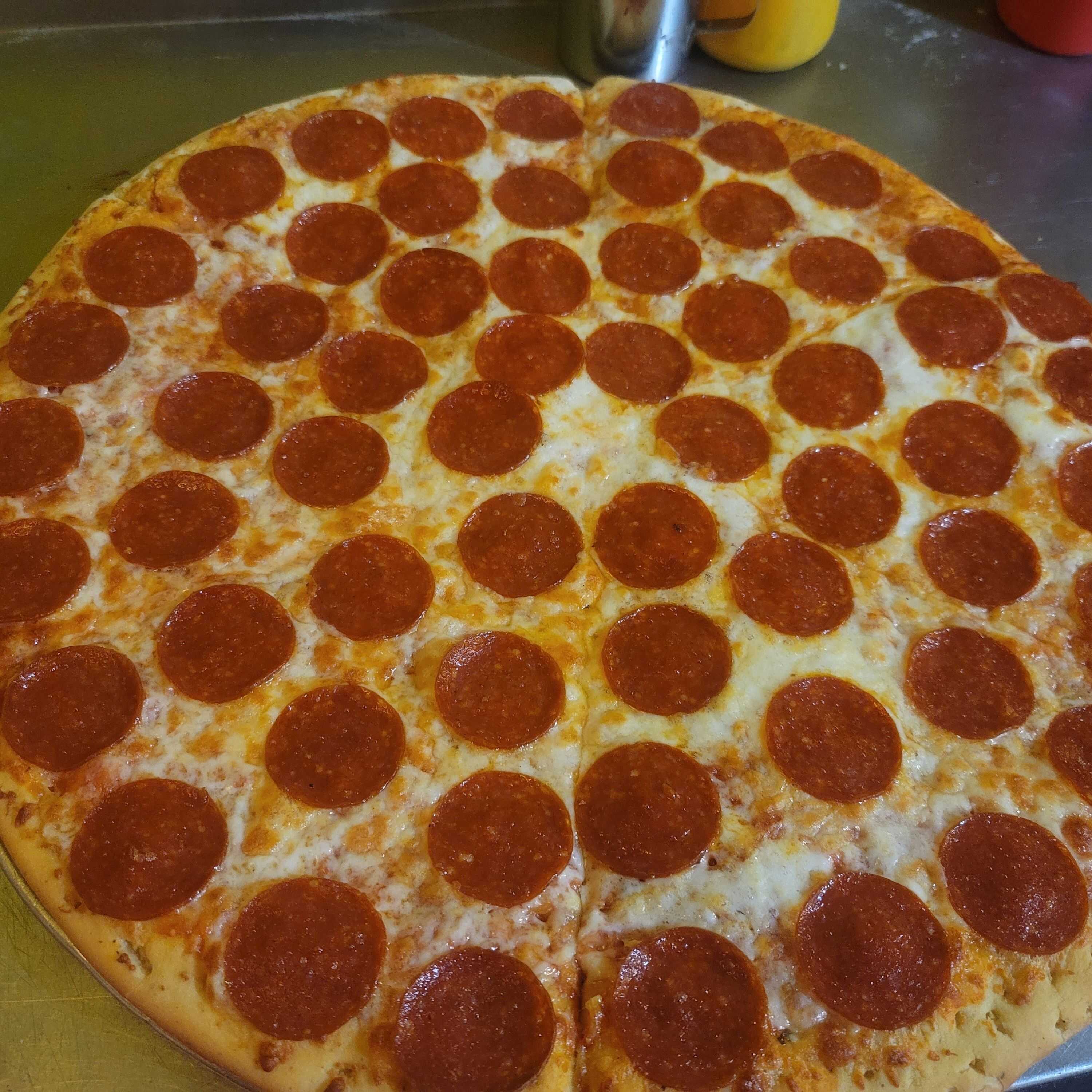 2 Pizzas Medianas 12" + 1 L. de agua