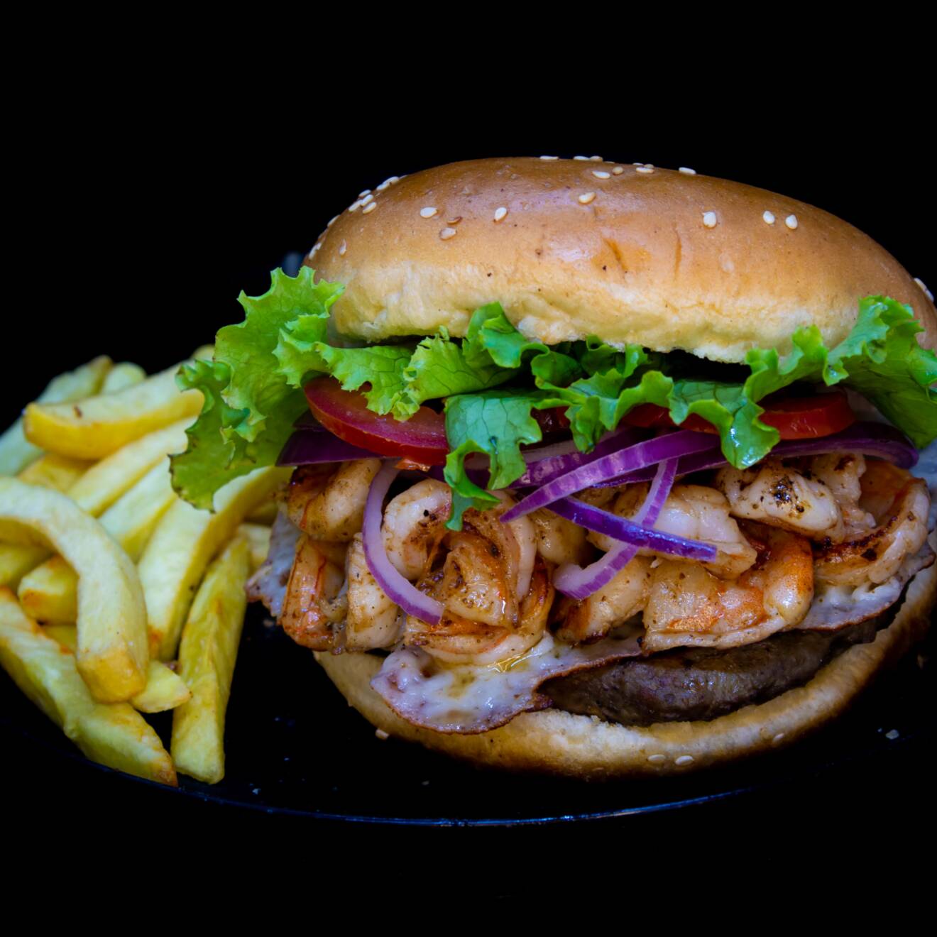 Hamburguesa Mar y Tierra y Papas