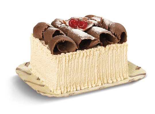 Bolo de massa de chocolate, recheio de mousse de Leite Ninho®, cobertura de mousse branca, raspas de chocolate ao leite, Leite Ninho® e cerejas decorativas.