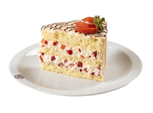 Bolo de massa branca, recheios de mousse de leite Ninho® com morangos e creme gelado com morangos, cobertura de mousse branca, trufado branco, calda de chocolate e morangos.