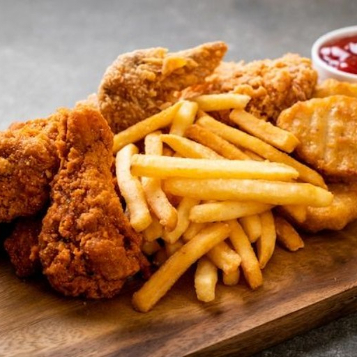 Nuggets con Papas Fritas