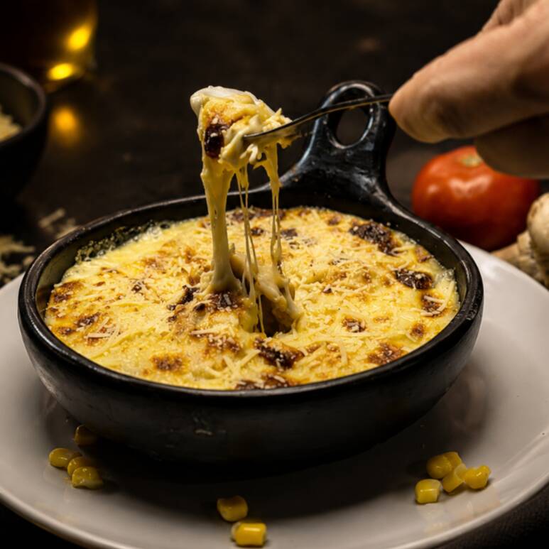 Maicitos Gratinados con Lomito de Cerdo