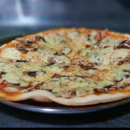 Pizza Personal (4 Porciones).