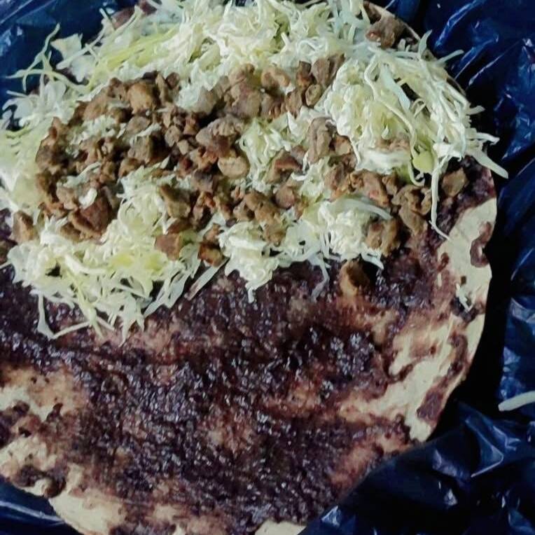 TLAYUDA ASADA