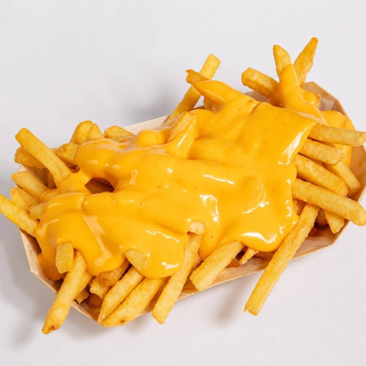 Papas a la Francesa con Queso Cheddar