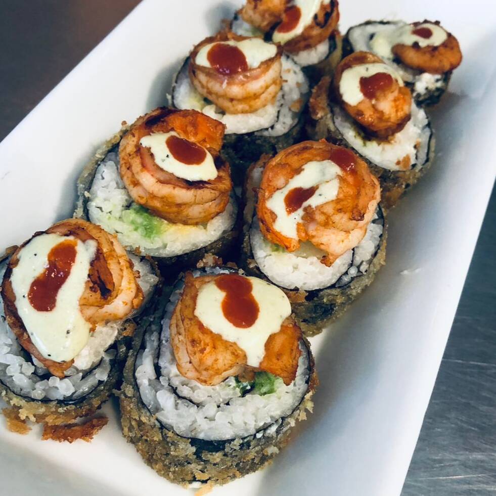 Nilo shushi empanizado + Agua Natural