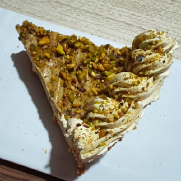 Rebanada de Pay de Queso y Pistache