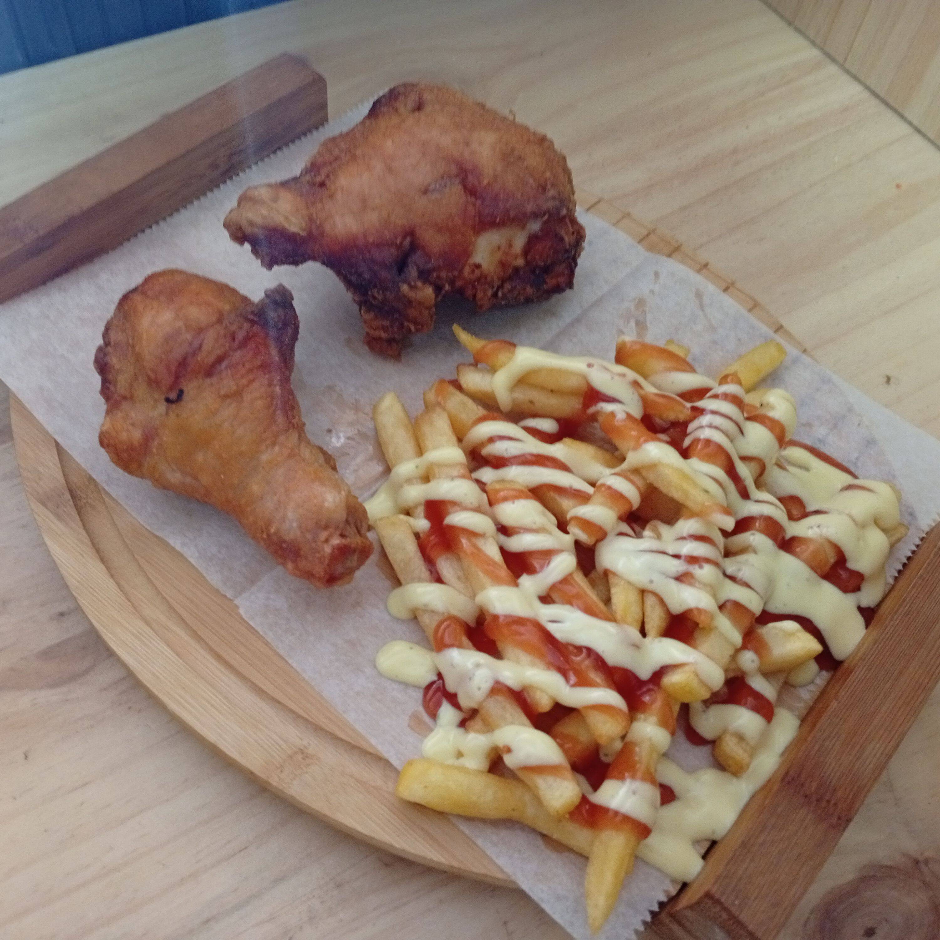 Pollo Frito Muslo + Cuarto con Papas