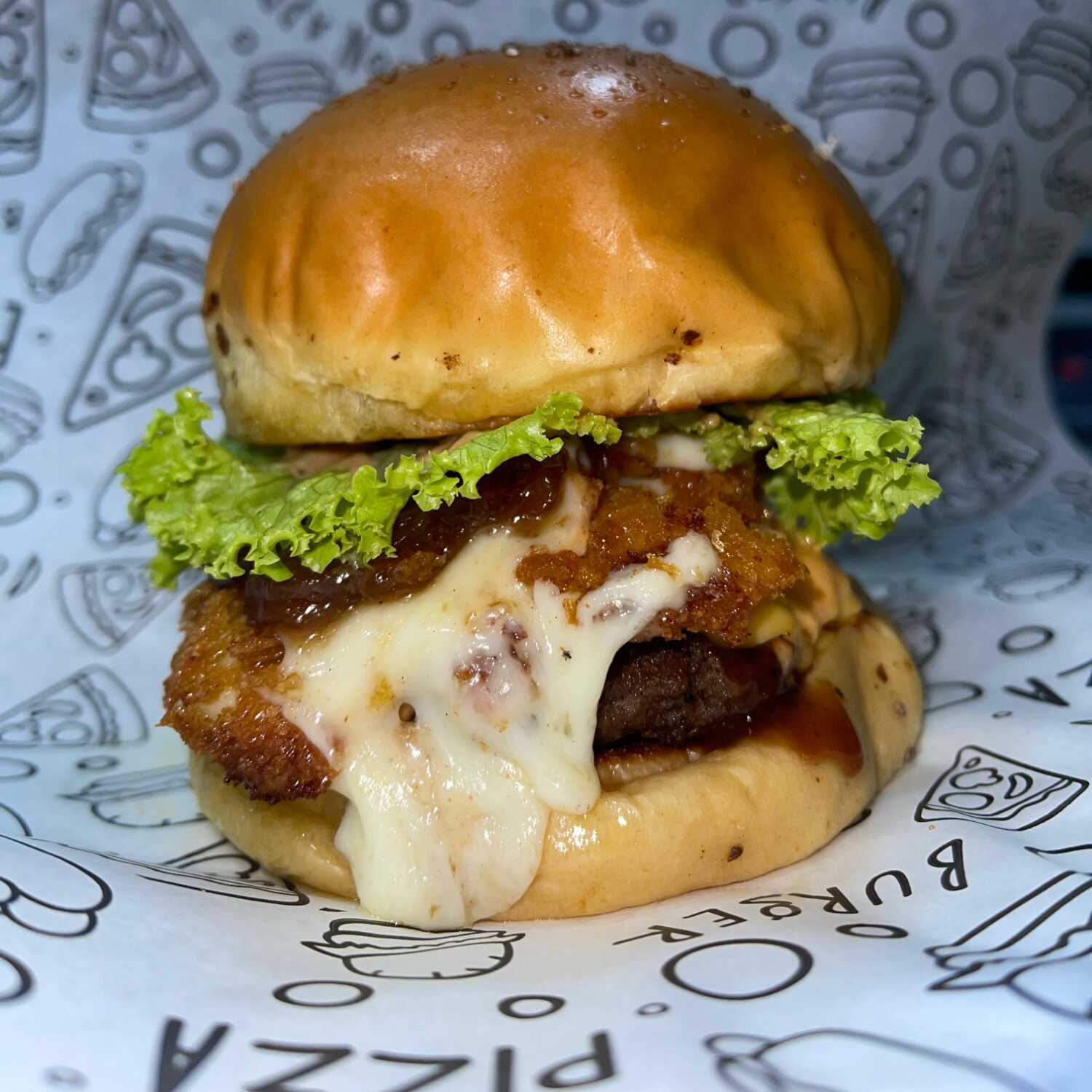 Hamburguesa Cheeseburguer + Gaseosa POSTOBÓN