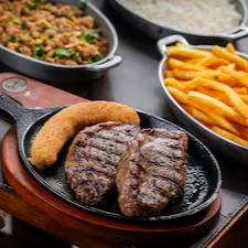 Picanha Angus 400g in natura. Acompanha: Arroz branco, feijão tropeiro, batata frita e banana à milanesa.