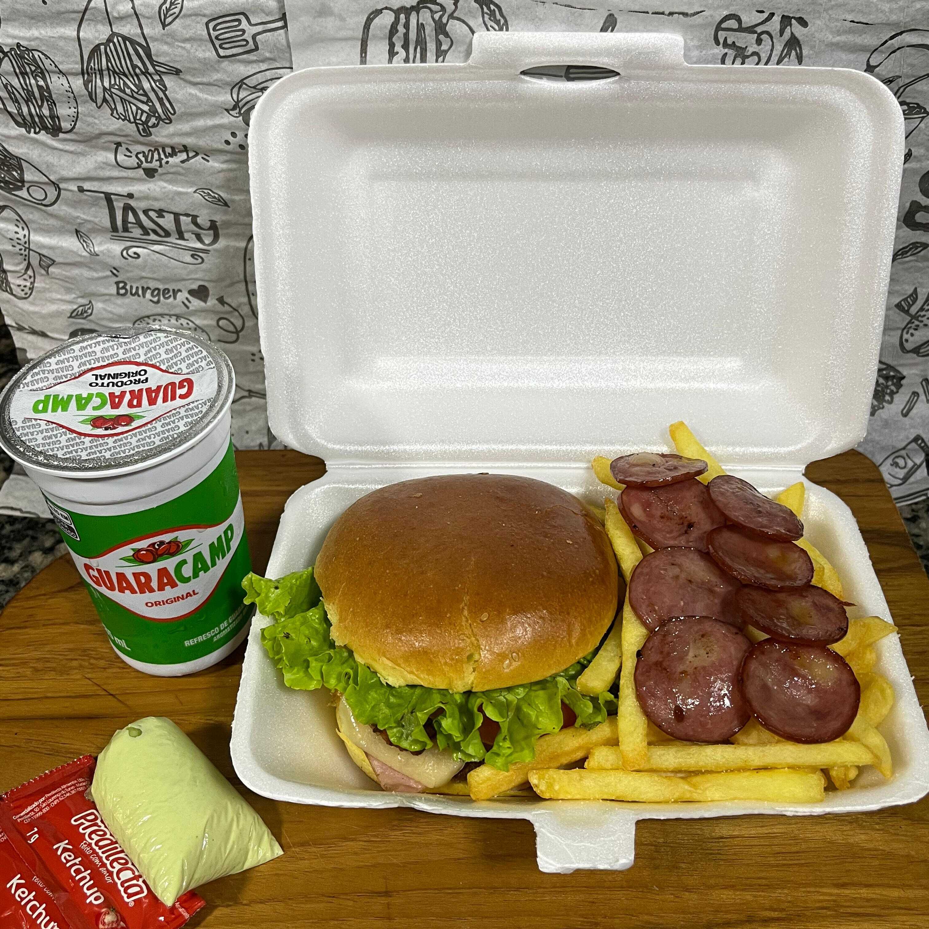 1 x tudo, batata frita c/ Calabresa e guaracamp