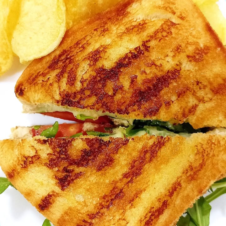Sándwich de Pollo Empanizado Bien Reportado