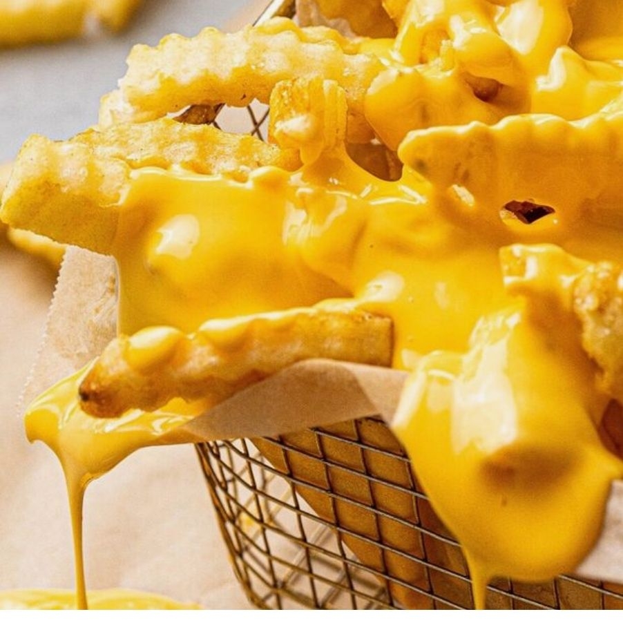 PAPAS BAÑADAS EN CHEDDAR
