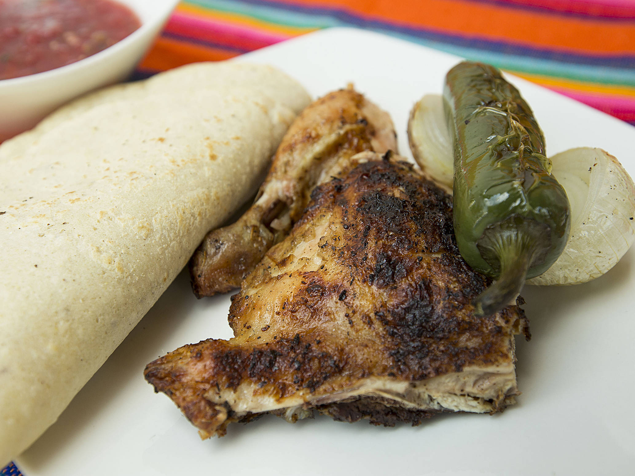 Combo- 1/2 Pollo + Orden de Arroz