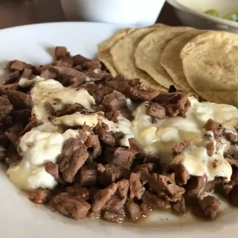 Bistec con queso