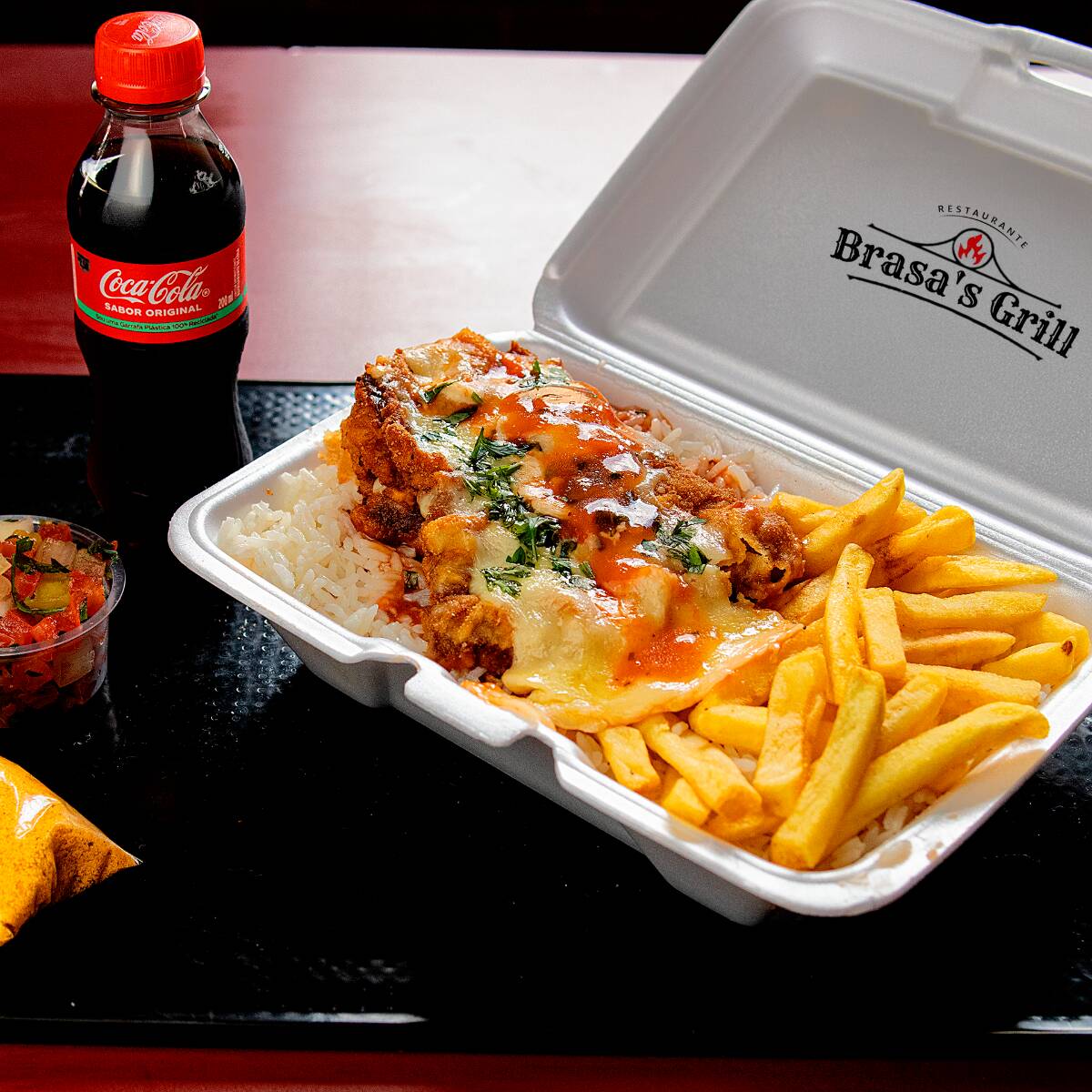 Acompanha arroz, feijão, salada e fritas + Caçulinha 200 ml