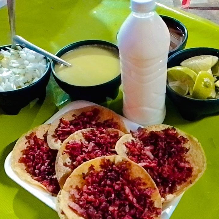 Paquete 7 Tacos + Agua del Día
