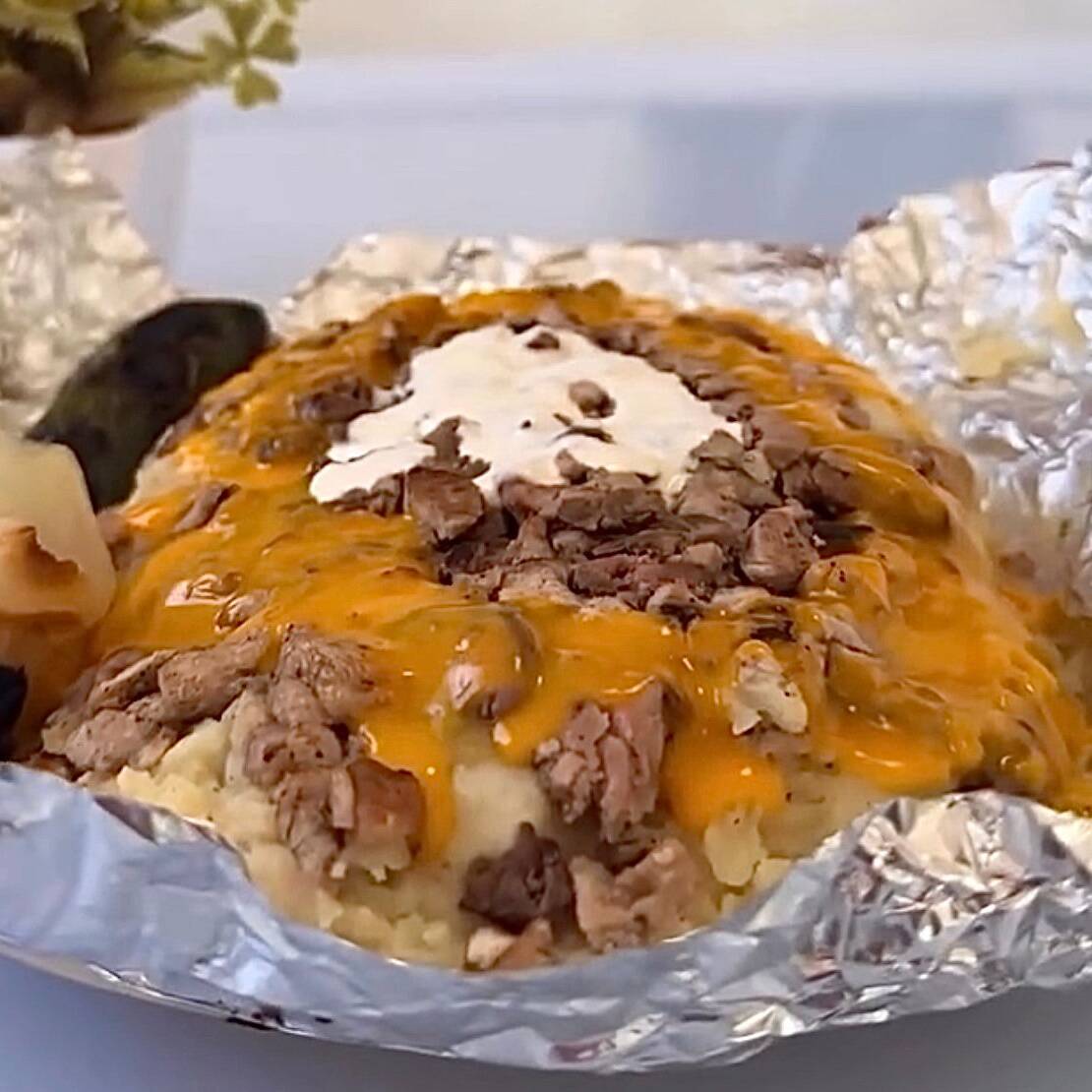 Papa con Came Asada de Puerco