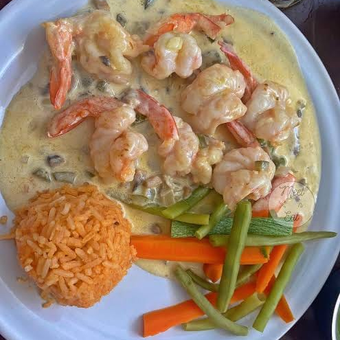 Camarón Empanizados En Crema De Champiñones