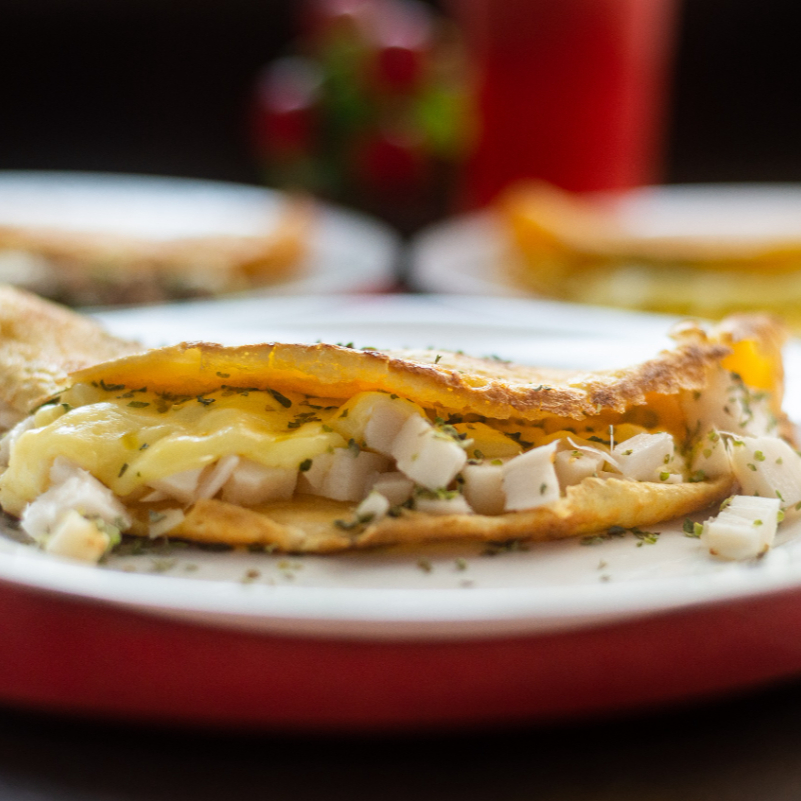 Maravilhosa crepioca de palmito com queijo e orégano.