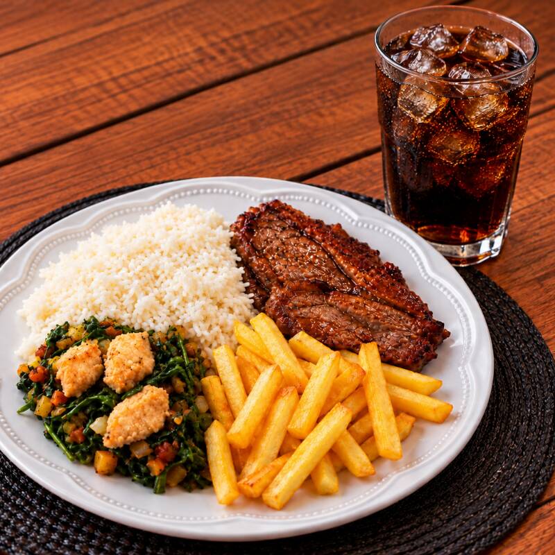 Cupim acompanhado de arroz branco, feijão tropeiro, batata frita e salada do dia, acompanhado de uma bebida 200ml grátis. Uma refeição completa, saborosa e bem servida.