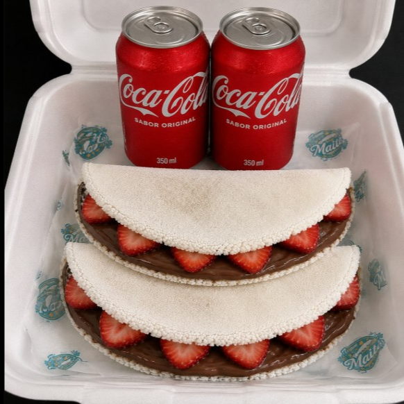 2 Deliciosa Tapiocas: com super recheio Nutella com morango e 2 Coca Colas de 350ml bem gelada.