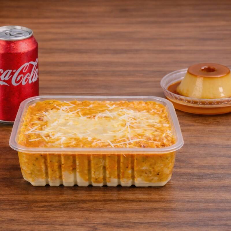 Uma refeição especial e mais que completa! Almoço, sobremesa e bebida, 1 lasanha individual (aprox.: 600g), 1 pudim (aprox.: 120g) e uma Refrigerante em Lata (350ml).