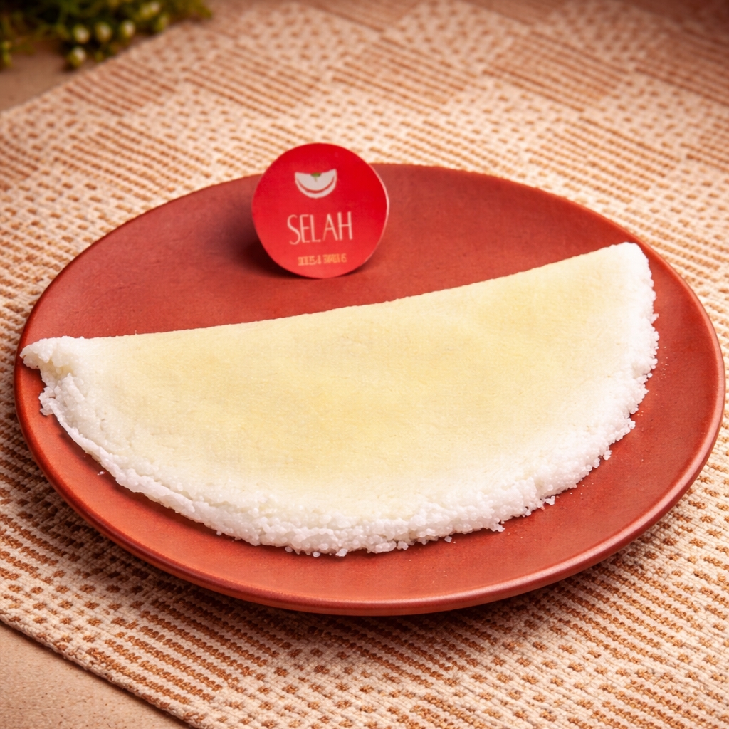 Nossa tapioca de manteiga tradicional mantém o equilíbrio entre maciez e crocância.
