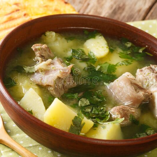 Caldo de Costilla Con Arroz y Arepitas