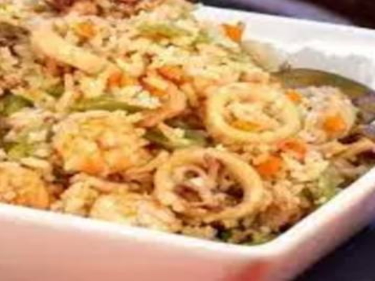Arroz con Pulpo y Camarón medio.
