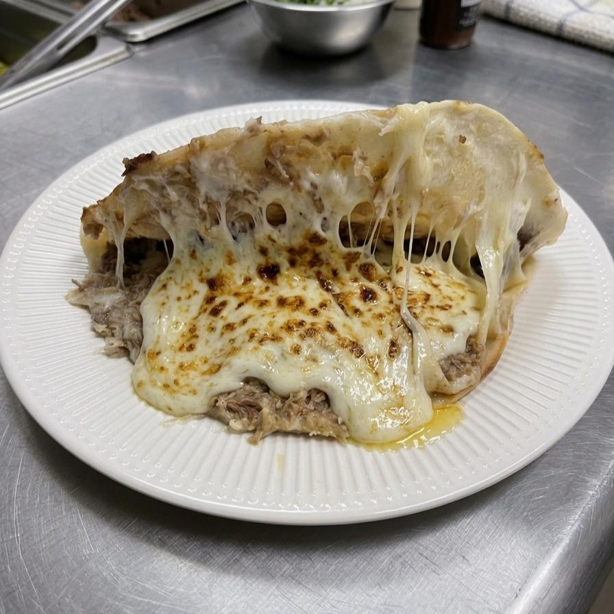 GRINGA JUMBO DE SUADERO CON QUESO ASADERO