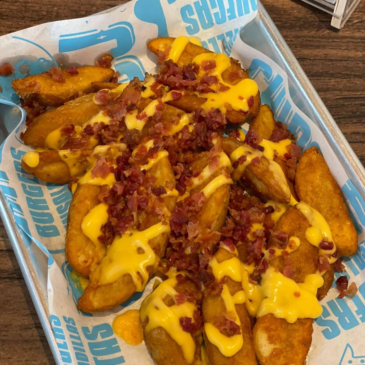 Papas Gajo Queso y Tocino.