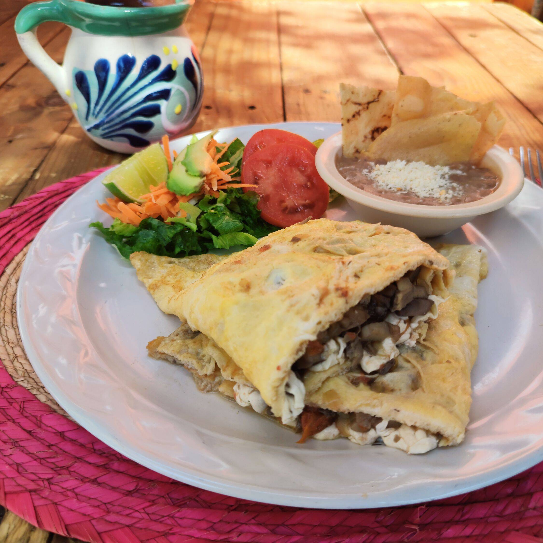 Omelette de jamón con queso