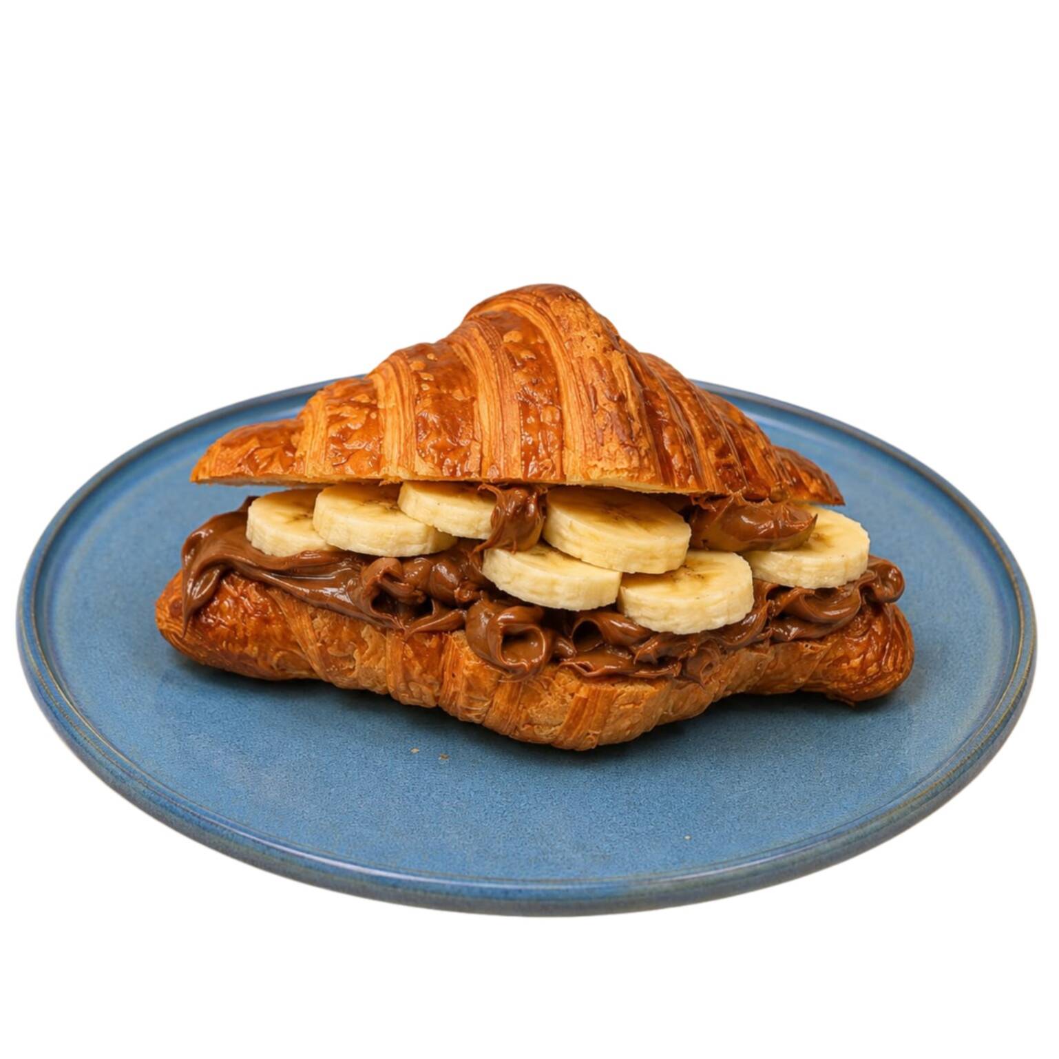 Croissant de massa folhada, leve e crocante, recheado com Doce de Leite Aviação e banana, proporcionando uma combinação irresistível de cremosidade e sabor.