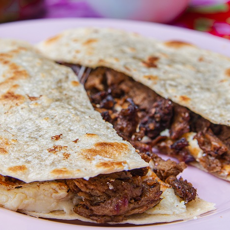 Gringa de Bistec o Chorizo