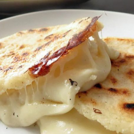 Ricas Arepas Asadas Acompañada de Jugo